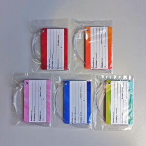 Kit com 05 Etiquetas (TAGS) PARA BAGAGEM em PVC 54x86 mm com alça em silicone transparente